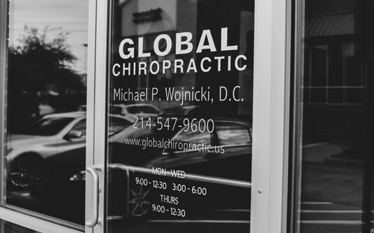 Chiropractic Allen TX Global Chiropractic Front Door A glass door that reads, Global Chiropractic.