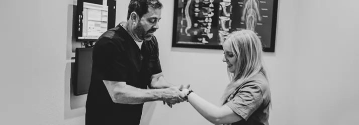 Chiropractor Allen TX Michael Wojnicki Adjusting Patient HP Chiropractor Allen TX Michael Wojnicki Adjusting Patient HP